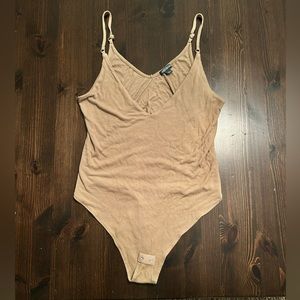 Deep v neck, ribbed, bodysuit.